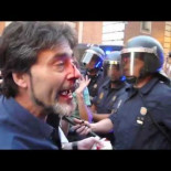 Un hombre con la nariz partida tras la violenta carga policial, Madrid 13 Julio 2012