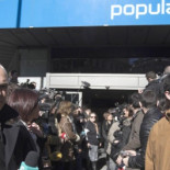 Gritos de "no es un partido, es una mafia" a las puertas de Génova