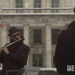 Saludos a Rajoy en Berlín con la banda sonora de El Padrino