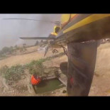 Secuencia a bordo de un helicóptero AS350 combatiendo un incendio forestal