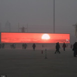 Pekín NO está viendo amaneceres en TV gigante debido a la polución