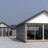 Video, fotos: Una empresa china crea 10 casas en un día con una impresora 3D