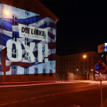 Die Linke proyecta la bandera griega con un "OXI" sobre el Ministerio de Finanzas alemán
