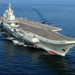 China envía un portaaviones, aviones y tropas a Siria