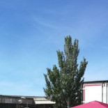 Dos tráilers ante el garaje dificultan grabar la entrada y salida de Rajoy de la Audiencia Nacional