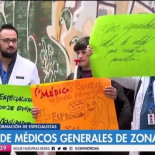 Pancarta en marcha de médicos
