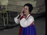 Artistas de la RPD de Corea interpretando la cantiga popular galega: "Vai lavar a cara" .
