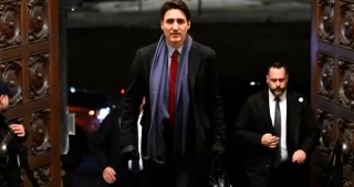 Los aranceles de Trump a Canadá pausados durante 30 días, anuncia Trudeau (ING)