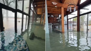 Los dueños de un restaurante lo inundan con agua limpia para que la sucia de una riada no se lo arruine y no entra ni una gota