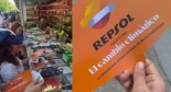 Activistas disfrazadas de azafatas reparten abanicos en la Feria del Libro con el lema "Repsol patrocina la crisis climática"