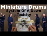 System Of A Down - Toxicity, con una batería en miniatura