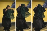 Polémica por la imagen de una mujer con burka en el metro de Madrid subida a las redes por la periodista de medio ultra