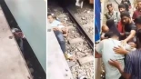 Un padre se lanza a las vías del tren para salvar a su hijo en Bangladesh