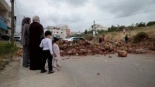 Colonos israelíes profanan un cementerio y fuerzan a palestinos a desenterrar a su hijo